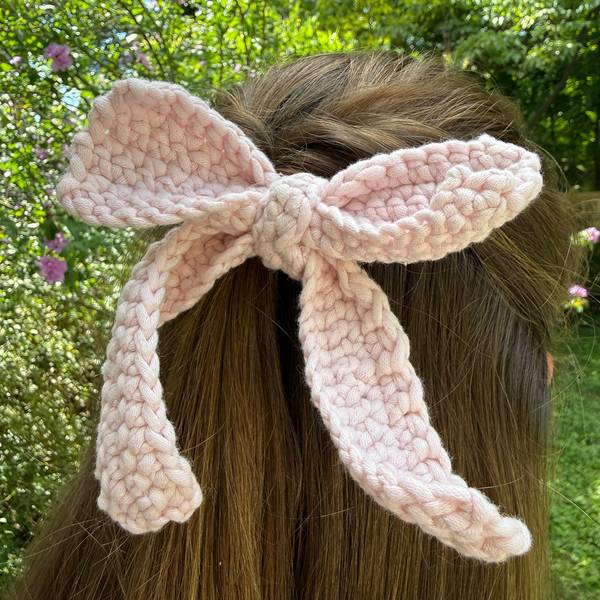 The bow worn in a half-up hairstyle